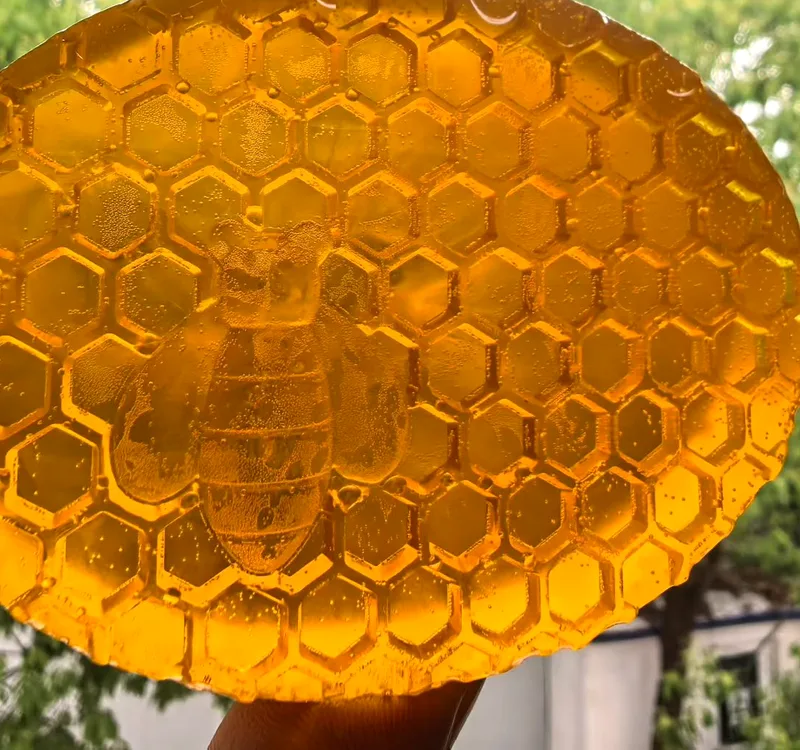 Amber honeycomb soap with bee pattern